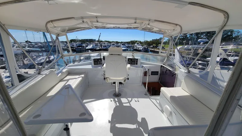 Slide: The Image of Flybridge of 2000 Jefferson Marquessa 60 MY yacht with seating and helm station. - 28