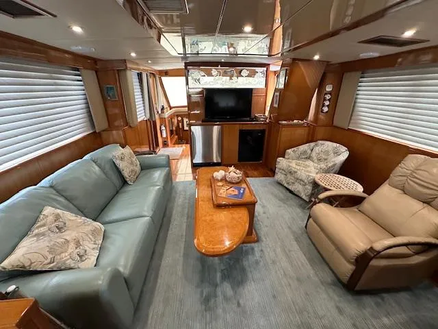 Slide: The Image of Luxurious interior of 2000 Jefferson Marquessa 60 MY yacht with plush seating and modern amenities. - 4