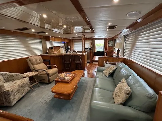Slide: The Image of Luxurious interior of 2000 Jefferson Marquessa 60 MY yacht with elegant seating and decor. - 5
