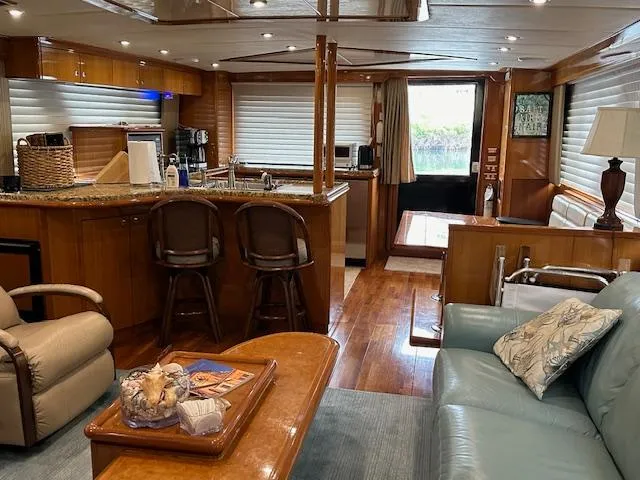 Slide: The Image of Luxurious interior of a 2000 Jefferson Marquessa 60 MY yacht with elegant furnishings. - 7