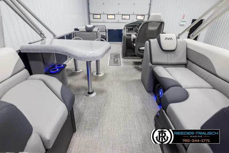 Slide: The Image of Luxurious interior of 2025 Avalon LSZ Entertainer pontoon boat with modern seating and LED lighting. - 16