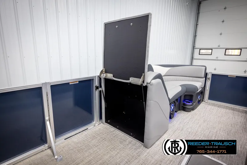 Slide: The Image of 2025 Avalon LSZ Entertainer pontoon interior with modern seating and storage compartment. - 21