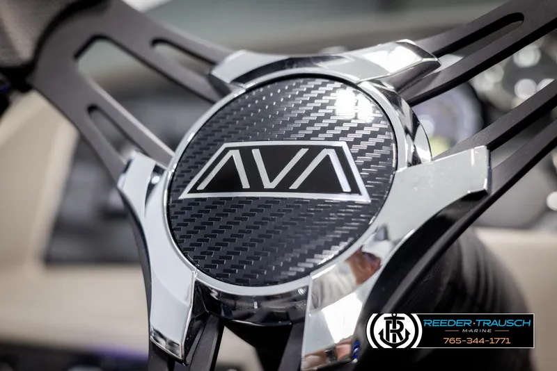 Slide: The Image of Close-up of Avalon LSZ Entertainer 2025 steering wheel with carbon fiber design. - 26