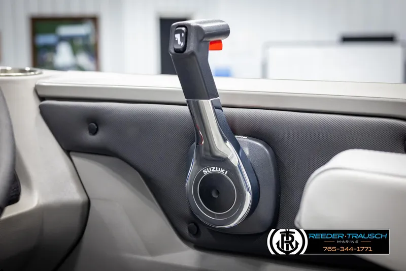 Slide: The Image of Suzuki throttle control in 2025 Avalon LSZ Entertainer boat interior. - 32