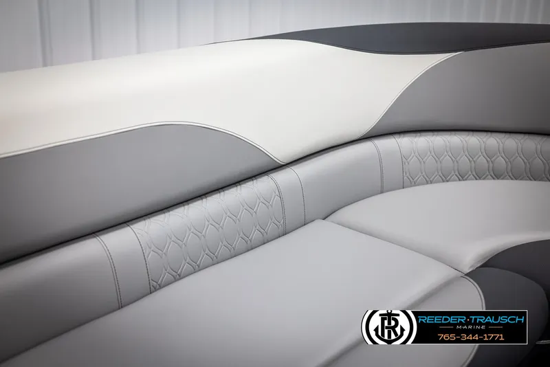 Slide: The Image of Luxurious seating on 2025 Avalon LSZ Entertainer boat, featuring elegant gray and white upholstery. - 34