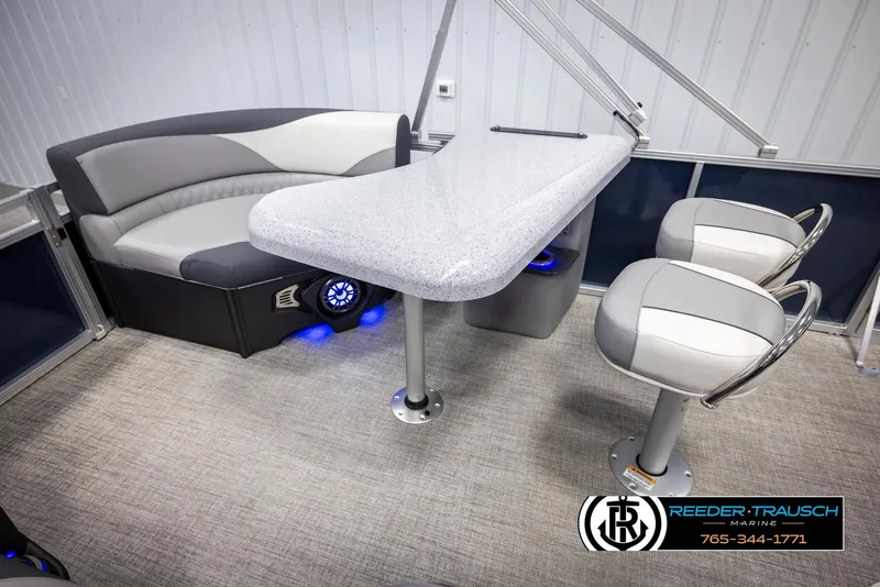 Slide: The Image of 2025 Avalon LSZ Entertainer interior with seating and table, featuring modern design and lighting. - 36