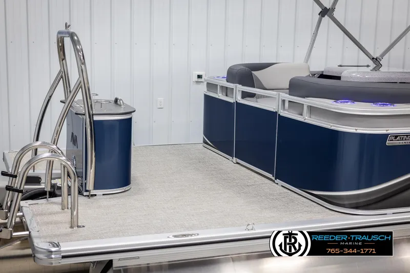 Slide: The Image of 2025 Avalon LSZ Entertainer pontoon boat with sleek blue design and modern features. - 48
