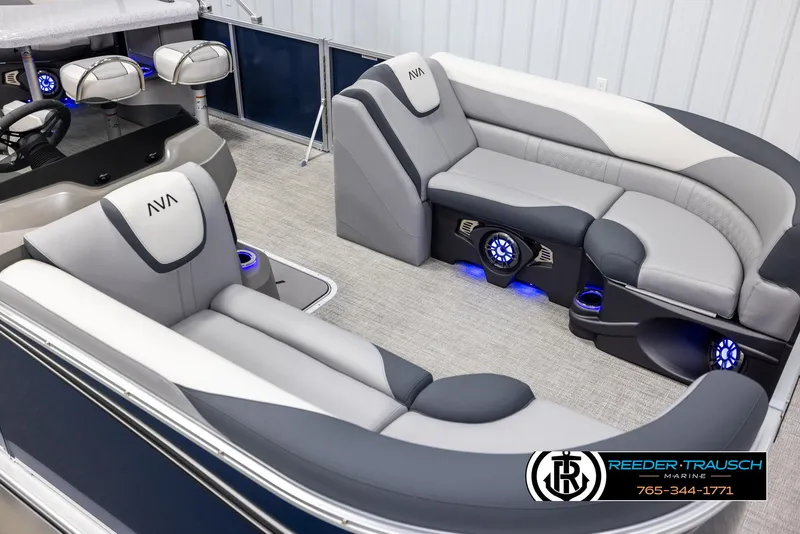 Slide: The Image of Luxurious 2025 Avalon LSZ Entertainer boat interior with plush seating and ambient lighting. - 9