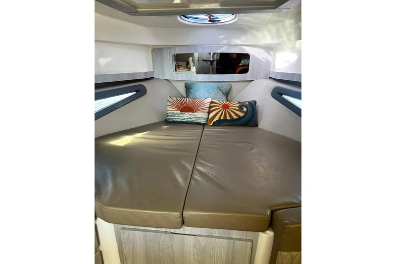 Slide: The Image of Luxurious interior of 2024 Hanover 375 boat with stylish cushions and modern design. - 14