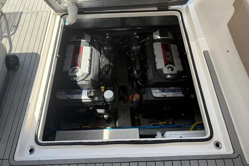 Slide: The Image of 2024 Hanover 375 boat engine compartment with dual 6.2L engines. - 6