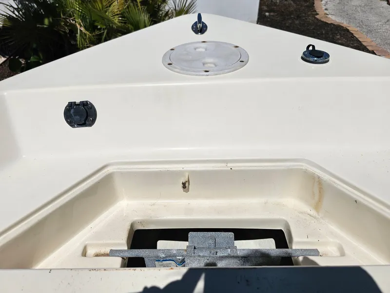 Slide: The Image of 2002 Sea Pro SV2100CC Bay Boat bow with storage compartment and deck fittings. - 31