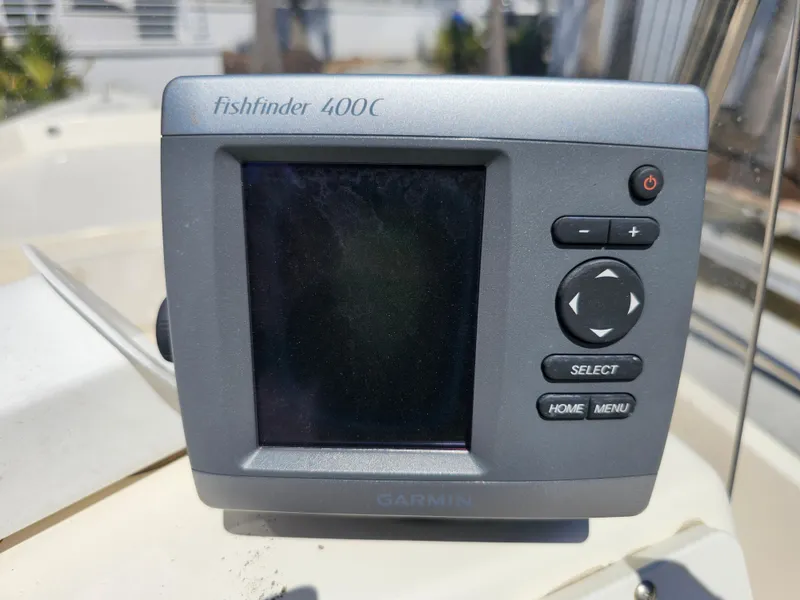 Slide: The Image of Garmin Fishfinder 400C on 2002 Sea Pro SV2100CC Bay Boat dashboard. - 42