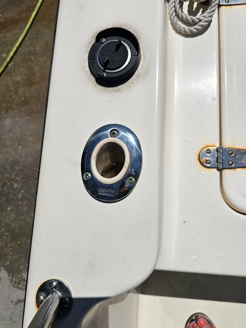 Slide: The Image of 2002 Sea Pro SV2100CC Bay Boat deck with rod holder and fuel cap. - 47