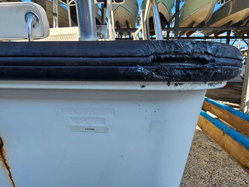 Slide: The Image of Damaged bow of 2012 Boston Whaler 210 Montauk boat in storage facility. - 10