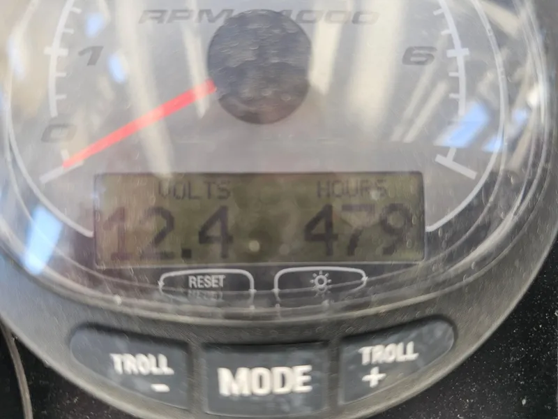 Slide: The Image of Close-up of a 2012 Boston Whaler 210 Montauk gauge showing 12.4 volts and 479 hours. - 29
