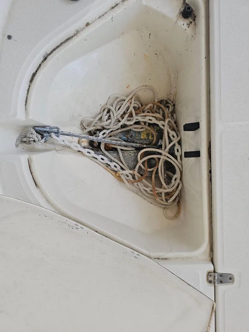 Slide: The Image of Anchor storage compartment on a 2012 Boston Whaler 210 Montauk boat. - 39