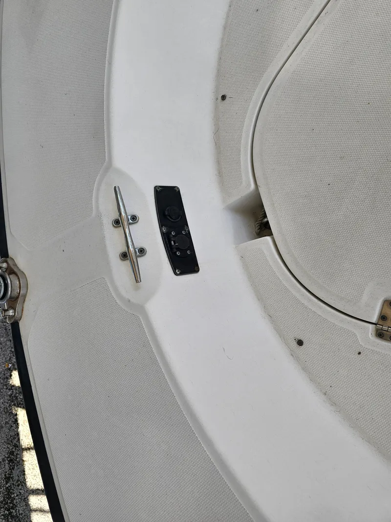 Slide: The Image of Close-up of 2012 Boston Whaler 210 Montauk boat deck with cleat and hatch. - 41
