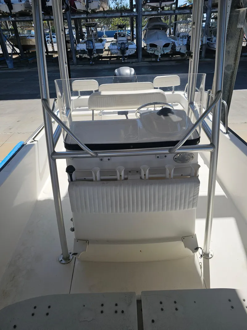 Slide: The Image of 2012 Boston Whaler 210 Montauk boat interior with steering console and seating. - 42