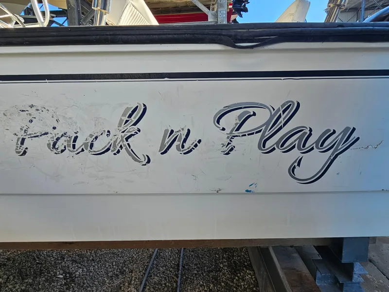Slide: The Image of 2012 Boston Whaler 210 Montauk boat with "Pack n Play" name on the side. - 7