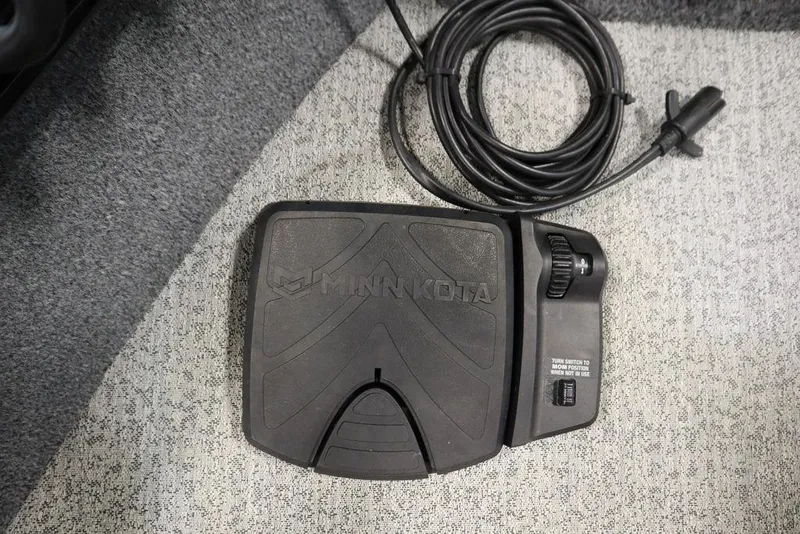 Slide: The Image of Minn Kota foot pedal on 2023 Tracker V16 Pro Guide WT boat. - 14