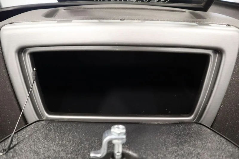 Slide: The Image of 2023 Tracker V16 Pro Guide WT dashboard compartment, open and empty. - 31