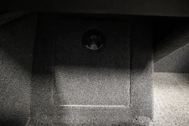Slide: The Image of Interior view of 2023 Tracker V16 Pro Guide WT boat storage compartment. - 32