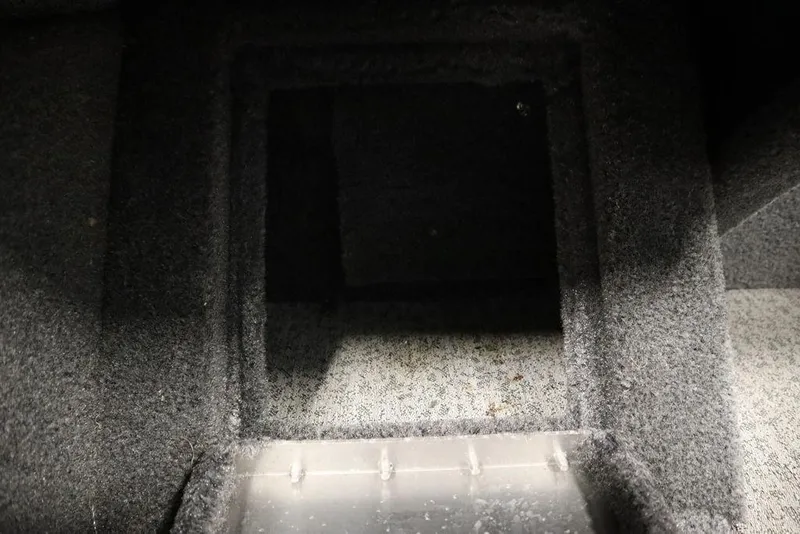 Slide: The Image of Interior storage compartment of 2023 Tracker V16 Pro Guide WT boat. - 33