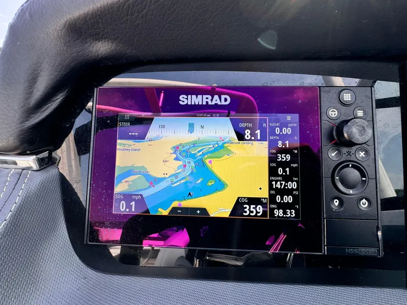 Slide: The Image of Simrad navigation display on 2021 Chaparral 307 SSX boat dashboard. - 19