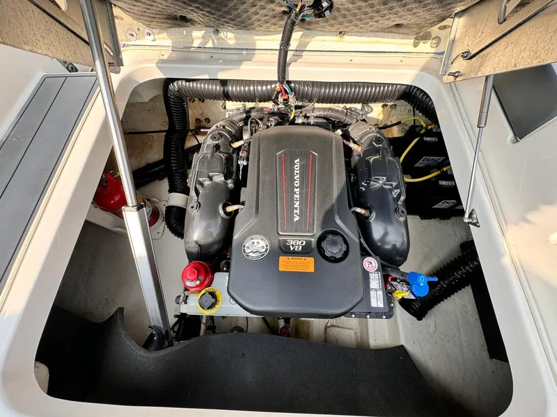 Slide: The Image of Engine compartment of 2021 Chaparral 307 SSX boat with Volvo Penta V8 engine. - 25