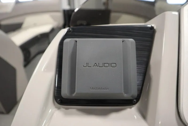 Slide: The Image of JL Audio system on 2021 SunChaser 23 SBX Eclipse Tri-Toon boat interior. - 23