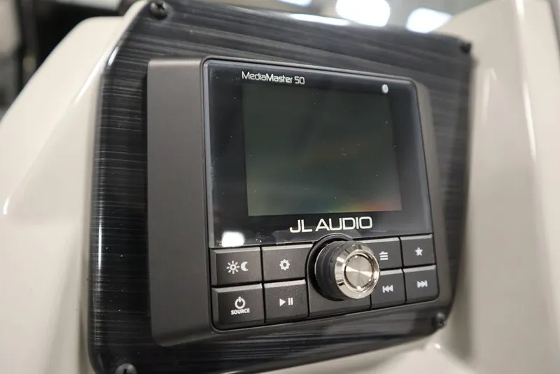 Slide: The Image of JL Audio MediaMaster 50 control panel on 2021 SunChaser 23 SBX Eclipse Tri-Toon. - 24