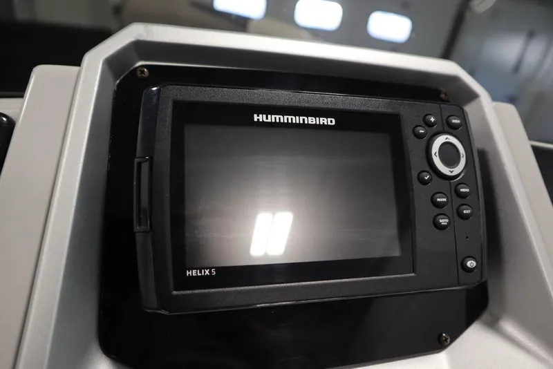 Slide: The Image of Humminbird Helix 5 fish finder on 2021 SunChaser 23 SBX Eclipse Tri-Toon dashboard. - 25