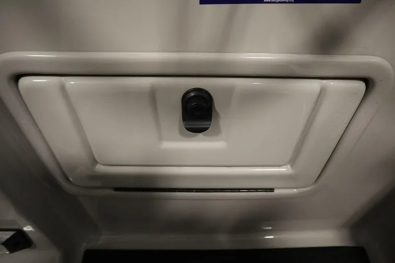 Slide: The Image of Storage compartment on 2021 SunChaser 23 SBX Eclipse Tri-Toon boat. - 29