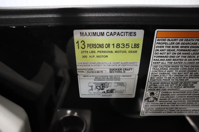 Slide: The Image of 2021 SunChaser 23 SBX Eclipse Tri-Toon capacity label, 13 persons or 1835 lbs, 300 HP motor. - 33