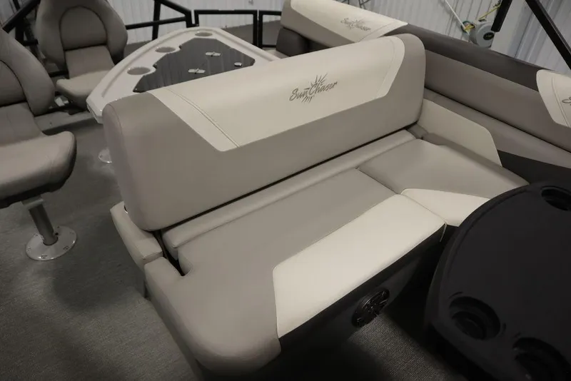 Slide: The Image of 2021 SunChaser 23 SBX Eclipse Tri-Toon interior seating with beige upholstery and cup holders. - 41