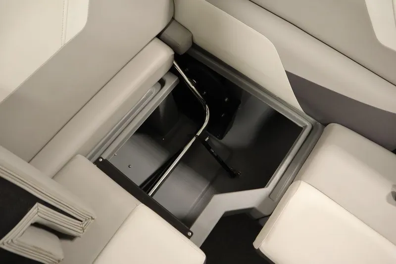 Slide: The Image of Interior storage compartment of 2021 SunChaser 23 SBX Eclipse Tri-Toon boat. - 42