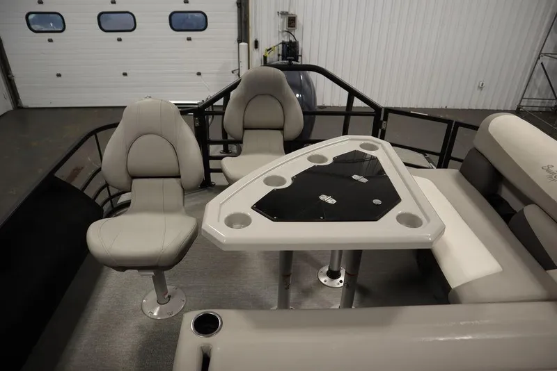 Slide: The Image of Interior of 2021 SunChaser 23 SBX Eclipse Tri-Toon with seating and table setup. - 46
