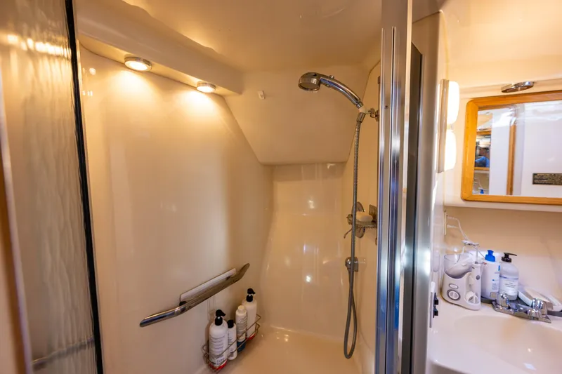 Slide: The Image of Luxurious bathroom in 1991 Sea Ray 420 Sundancer yacht with shower and vanity. - 28