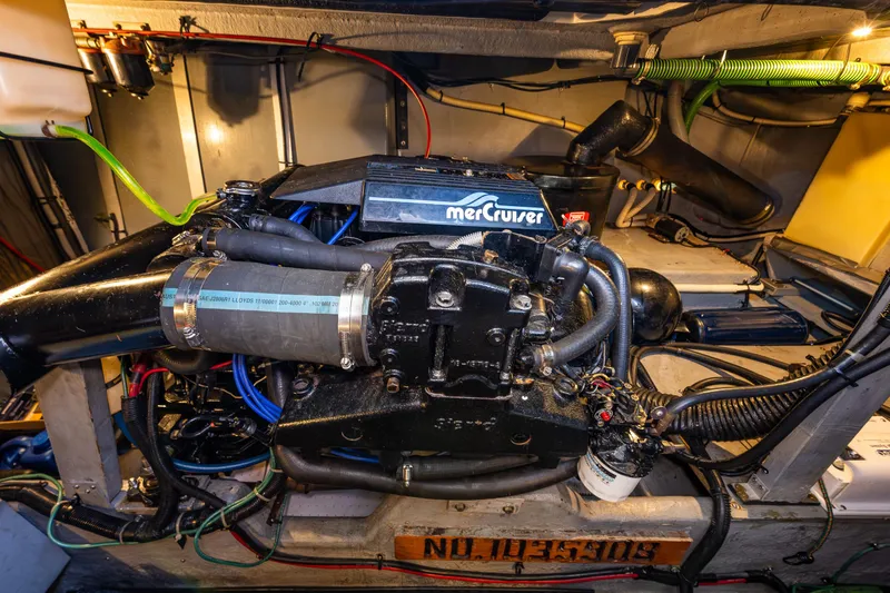 Slide: The Image of Engine compartment of a 1991 Sea Ray 420 Sundancer with MerCruiser engine. - 37