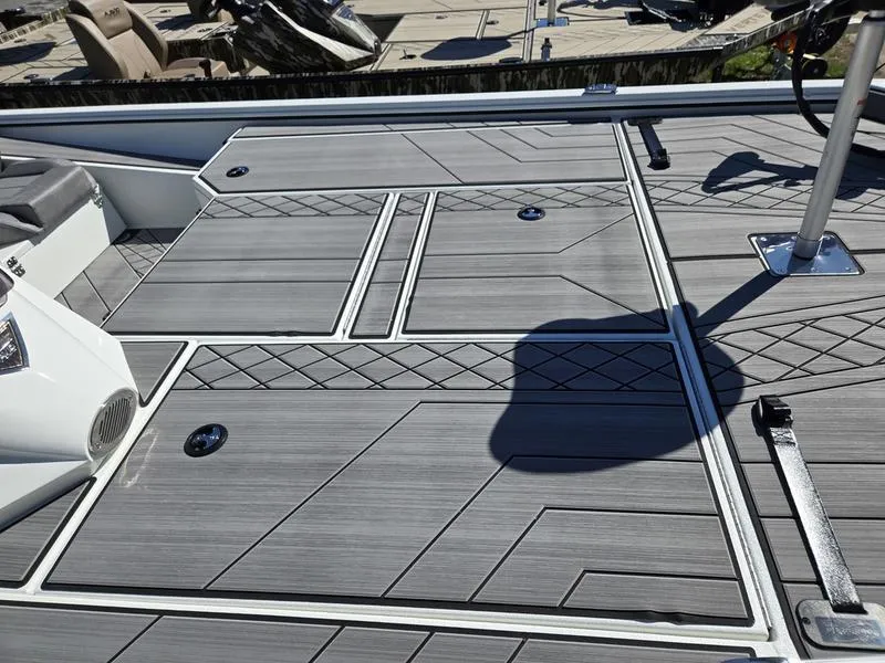 Slide: The Image of 2025 Avid 20 Vertex boat deck with sleek, modern design and textured surface. - 11