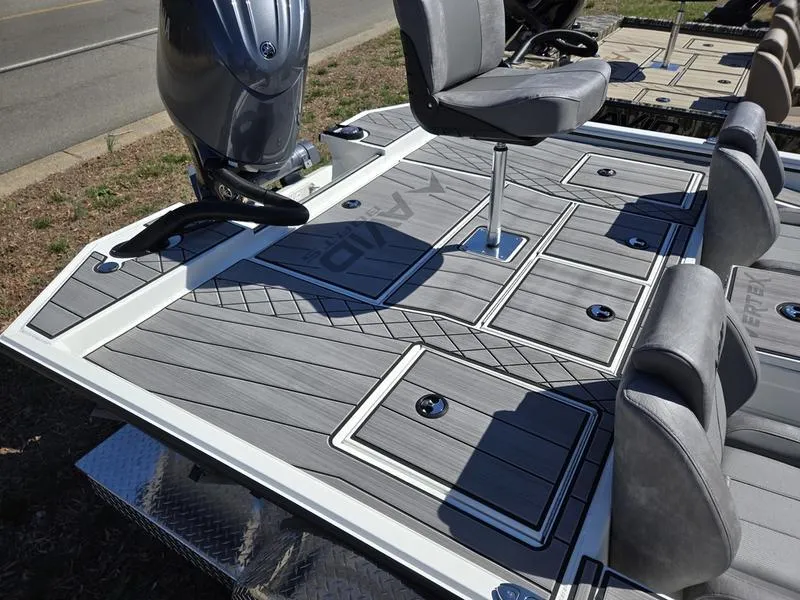 Slide: The Image of 2025 Avid 20 Vertex boat deck with seating and storage compartments. - 14