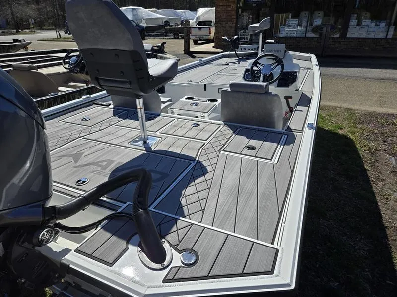 Slide: The Image of 2025 Avid 20 Vertex boat with sleek deck design and modern seating. - 17