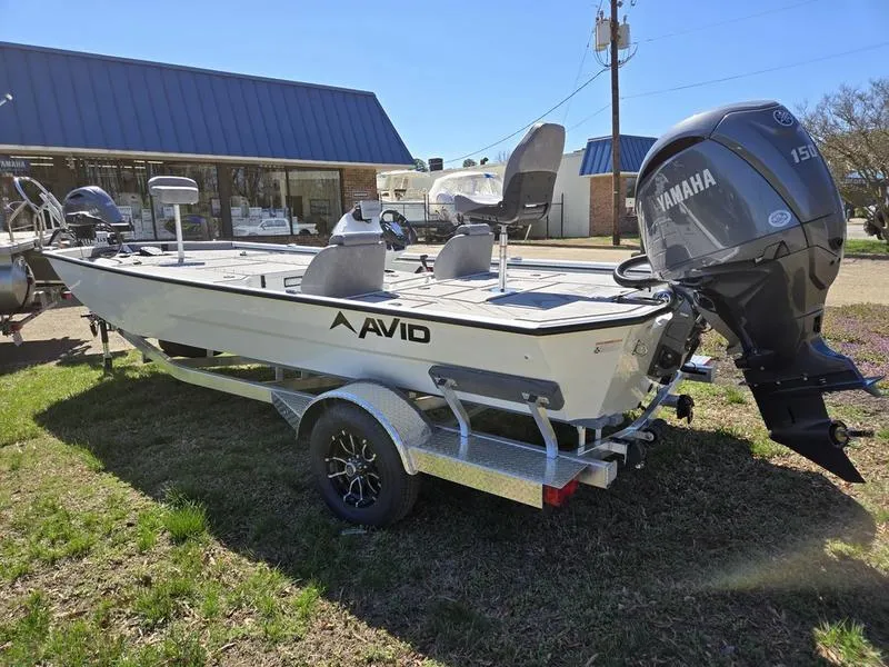 Slide: The Image of 2025 Avid 20 Vertex boat with Yamaha motor on trailer, parked outdoors. - 4