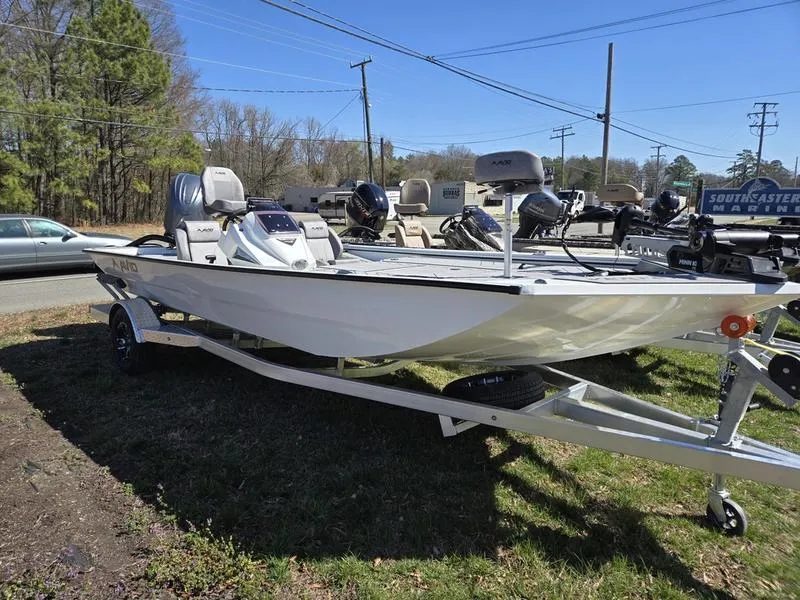 Slide: The Image of 2025 Avid 20 Vertex boat on trailer, parked outdoors, sunny day. - 8