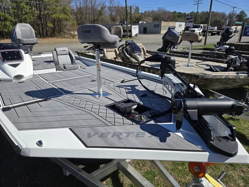 Slide: The Image of 2025 Avid 20 Vertex fishing boat with advanced seating and equipment on display. - 9