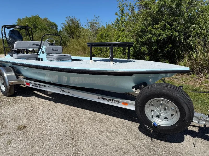 Slide: The Image of 2025 Maverick HPX 17 HPX-S boat on trailer, parked outdoors. - 12