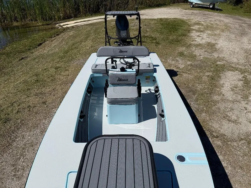 Slide: The Image of 2025 Maverick HPX 17 HPX-S boat on grassy terrain near water. - 14