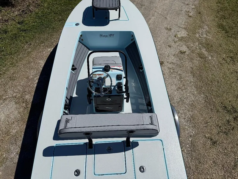 Slide: The Image of 2025 Maverick HPX 17 HPX-S boat, top view, showcasing steering console and seating. - 18