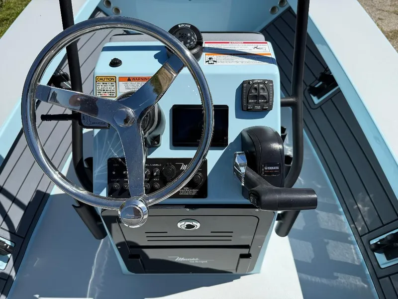 Slide: The Image of 2025 Maverick HPX 17 HPX-S boat console with steering wheel and controls. - 19
