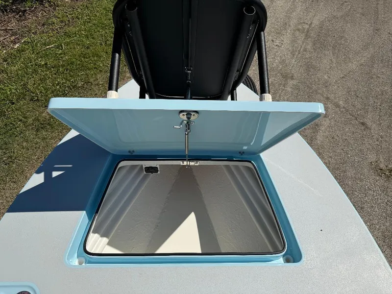 Slide: The Image of Open storage compartment on 2025 Maverick HPX 17 HPX-S boat, showing interior details. - 20